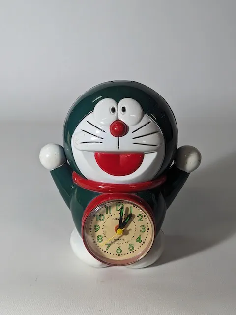 綠色塑膠小叮噹造型鬧鐘(Y)
