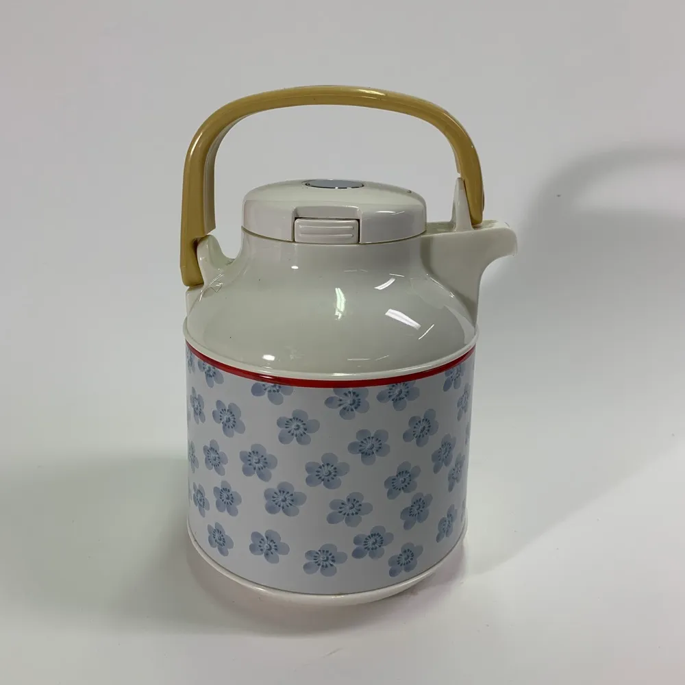 塑膠白色花朵圖騰保溫壺