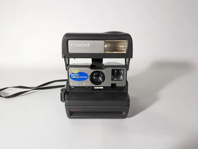 塑膠黑色拍立得(Polaroid OneStep talking camera)